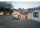 Backyard with patio, artificial turf, privacy wall, and sunset at 3101 E Sells Dr, Phoenix, AZ 85016