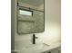 Modern bathroom with a sleek mirror, stylish vanity, and contemporary fixtures at 3101 E Sells Dr, Phoenix, AZ 85016