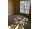 Bedroom with wood-look flooring and large window with natural light shining through blinds at 3131 W Cochise Dr # 218, Phoenix, AZ 85051
