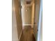 Hallway offers clean lines, modern flooring, and fresh paint, creating a seamless transition between rooms with neutral color scheme at 3131 W Cochise Dr # 218, Phoenix, AZ 85051