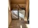 Laundry room includes stacked washer and dryer with tile flooring at 3131 W Cochise Dr # 218, Phoenix, AZ 85051