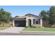 Charming single-story home featuring a tile roof, stucco exterior, and a two-car garage at 3255 E Baler Dr, San Tan Valley, AZ 85140