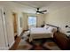 Bright bedroom with ceiling fan, natural light, and a view, creating a comfortable and inviting space at 3314 N 68Th St # 107, Scottsdale, AZ 85251