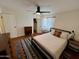 Brightly lit bedroom with doors to both the bathroom and a walk-in closet at 3314 N 68Th St # 107, Scottsdale, AZ 85251