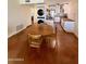 Dining area adjacent to kitchen, featuring laundry, modern appliances, dining table and comfortable chairs at 3314 N 68Th St # 107, Scottsdale, AZ 85251
