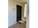 Secured front door of unit 107 with a metal security screen at 3314 N 68Th St # 107, Scottsdale, AZ 85251