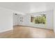 Open-concept living area filled with light and hardwood floors at 3616 E Fairmount Ave, Phoenix, AZ 85018