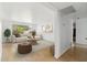 Bright living room filled with light, neutral furniture and hardwood floors at 3616 E Fairmount Ave, Phoenix, AZ 85018