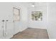 Sunroom featuring windows, tile flooring and a door to the exterior at 3616 E Fairmount Ave, Phoenix, AZ 85018