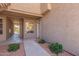 Exterior shot of the building with a well-maintained entrance and landscaping at 3830 E Lakewood E Pkwy # 1007, Phoenix, AZ 85048