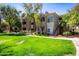 Well-maintained apartment buildings surrounded by green spaces and trees, offering a peaceful environment at 3830 E Lakewood E Pkwy # 1007, Phoenix, AZ 85048
