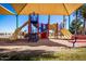 Playground featuring colorful equipment including slides and climbing areas, perfect for children at 3830 E Lakewood E Pkwy # 1007, Phoenix, AZ 85048