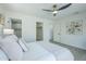 This inviting bedroom boasts a walk-in closet and a soothing color palette at 47 Spur Cir, Scottsdale, AZ 85251