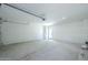 Spacious two car garage with pedestrian door to backyard at 47 Spur Cir, Scottsdale, AZ 85251