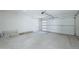 Spacious two car garage with paneled garage door at 47 Spur Cir, Scottsdale, AZ 85251