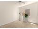 Bright bedroom featuring neutral walls, a ceiling fan, and natural light at 623 W Harvard Ave, Gilbert, AZ 85233