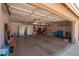 Spacious garage with storage shelving and a clean, uncluttered appearance at 623 W Harvard Ave, Gilbert, AZ 85233