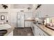 This kitchen features granite countertops, and stainless-steel appliances at 623 W Harvard Ave, Gilbert, AZ 85233