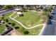 Aerial view of the green space and walking path that leads to the playground area at 623 W Harvard Ave, Gilbert, AZ 85233