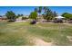 Park featuring playground equipment and mature shade trees at 623 W Harvard Ave, Gilbert, AZ 85233