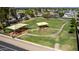 Aerial view of the local playground, including a shaded playground and walking path at 623 W Harvard Ave, Gilbert, AZ 85233