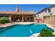 A private backyard oasis with sparkling pool perfect for entertaining and relaxation at 623 W Harvard Ave, Gilbert, AZ 85233