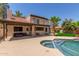 Backyard featuring a pool, patio, and potential outdoor living space at 635 N Yale Dr, Gilbert, AZ 85234