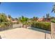 Balcony view overlooking lush landscaping and community pool at 635 N Yale Dr, Gilbert, AZ 85234