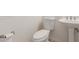 Clean bathroom featuring pedestal sink and new toilet at 635 N Yale Dr, Gilbert, AZ 85234