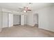 Spacious bedroom featuring double door closet and neutral carpet at 635 N Yale Dr, Gilbert, AZ 85234
