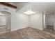 Bright dining room featuring wood floors, stylish chandelier, and neutral walls at 635 N Yale Dr, Gilbert, AZ 85234
