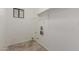 Bright laundry room with tile floors, utility sink, and ample storage space at 635 N Yale Dr, Gilbert, AZ 85234