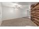 Bright living room featuring wood accent wall and neutral colors at 635 N Yale Dr, Gilbert, AZ 85234