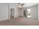 Spacious main bedroom with neutral walls and access to outdoor patio at 635 N Yale Dr, Gilbert, AZ 85234