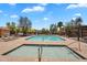 Inviting community pool area with a separate spa and ample lounge seating for residents at 6469 W Ruth Ave, Glendale, AZ 85302