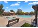 Community pool and spa area with inviting lounge chairs and well-maintained landscaping at 6469 W Ruth Ave, Glendale, AZ 85302