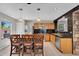 Spacious kitchen featuring seating at the island and stainless steel appliances at 6469 W Ruth Ave, Glendale, AZ 85302