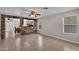 Spacious living room with tile flooring, stone accents, and ample natural light at 6469 W Ruth Ave, Glendale, AZ 85302