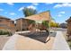 Community playground with covered play area and benches, perfect for Gathering fun at 6469 W Ruth Ave, Glendale, AZ 85302