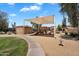 Shaded community playground with various play structures in a safe and enjoyable environment at 6469 W Ruth Ave, Glendale, AZ 85302