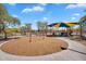 Community playground featuring slides, swings and play equipment at 6469 W Ruth Ave, Glendale, AZ 85302
