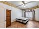 This bedroom features a unique ceiling design and a well-lit window at 7217 S Hazelton Ln, Tempe, AZ 85283