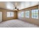 A bright and spacious bedroom, complete with multiple large windows at 7217 S Hazelton Ln, Tempe, AZ 85283