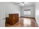 Bedroom with natural light, crown molding and wood cabinet at 7217 S Hazelton Ln, Tempe, AZ 85283
