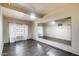 Bedroom with hardwood floors, natural light, and a ceiling fan at 7217 S Hazelton Ln, Tempe, AZ 85283