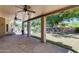 Covered patio perfect for outdoor entertaining overlooking landscaped backyard and pool at 7217 S Hazelton Ln, Tempe, AZ 85283