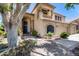 Beautiful home exterior featuring a quaint balcony, manicured landscaping, and a welcoming front entrance at 7217 S Hazelton Ln, Tempe, AZ 85283