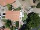 Aerial view of a house with a putting green and outdoor games area, perfect for outdoor entertainment at 7512 W Tonto Dr, Glendale, AZ 85308
