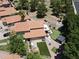 Aerial view of the house with a putting green and outdoor games and patio, perfect for entertaining at 7512 W Tonto Dr, Glendale, AZ 85308