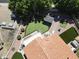 Aerial view of the backyard featuring a putting green, covered patio, and outdoor games at 7512 W Tonto Dr, Glendale, AZ 85308